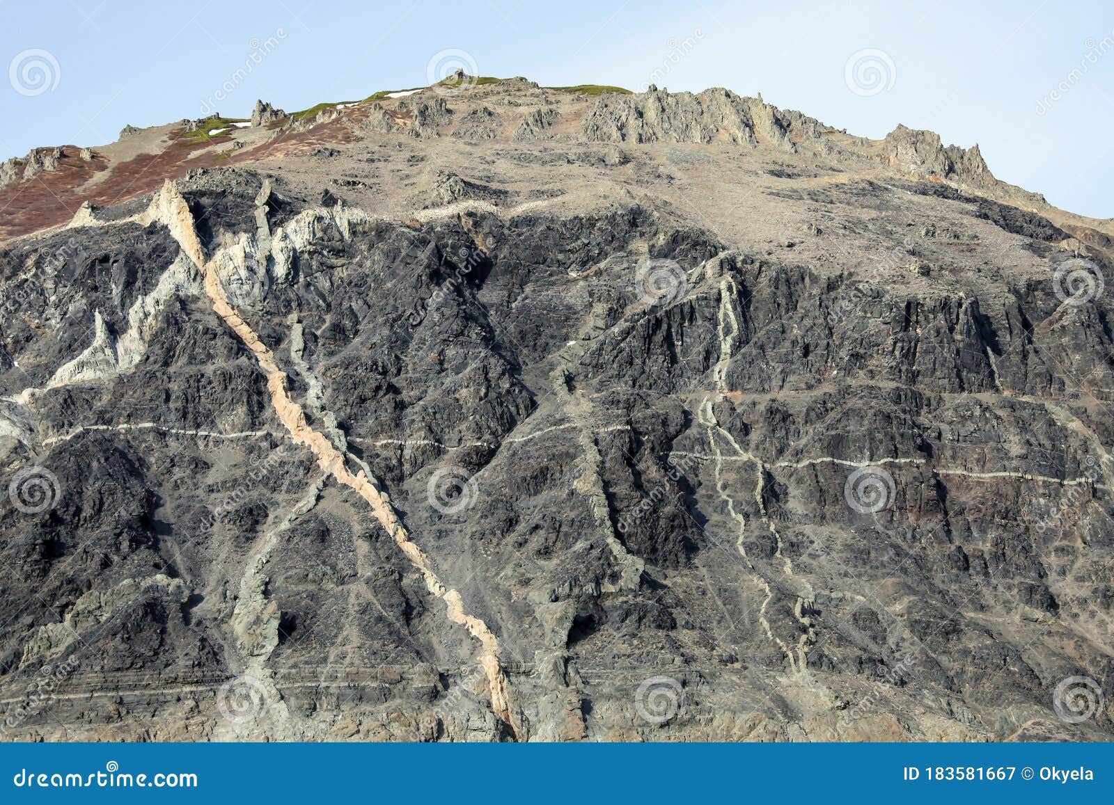 geological outcrops with the exit of vein formations to the surface of the sea coastline