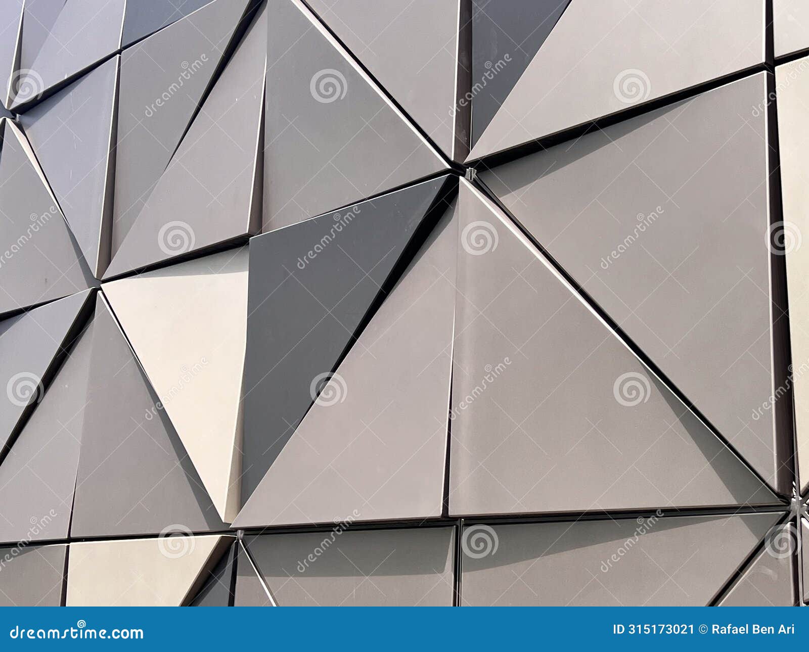 geometrical triangular  on metal building wall