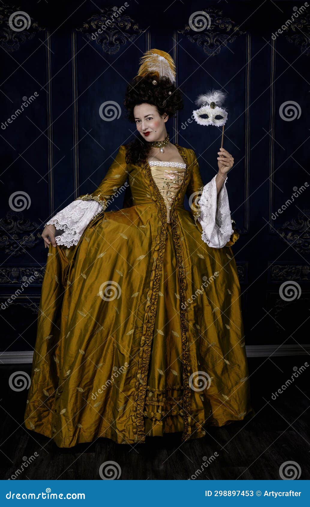 georgian period woman wearing a silk dress and holding a mask
