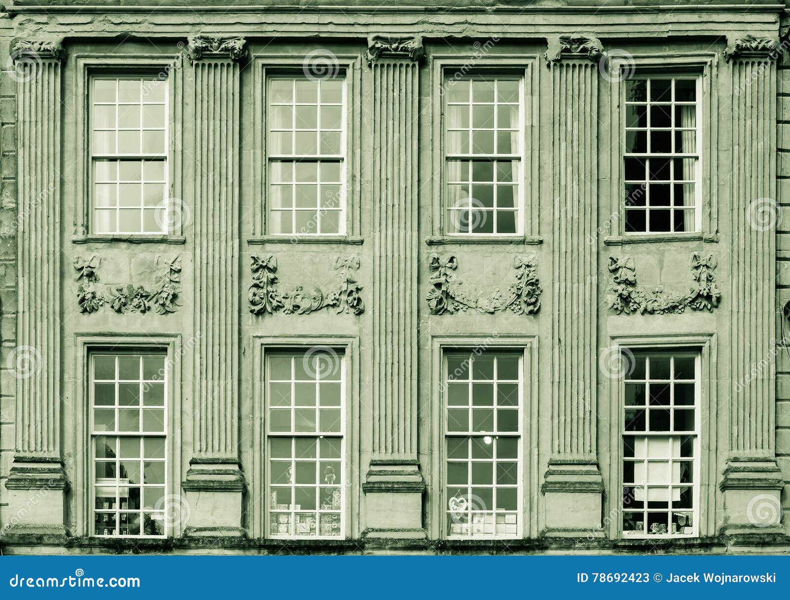 Sash Windows with Old Ionic Pillars and Decoration Stock Image