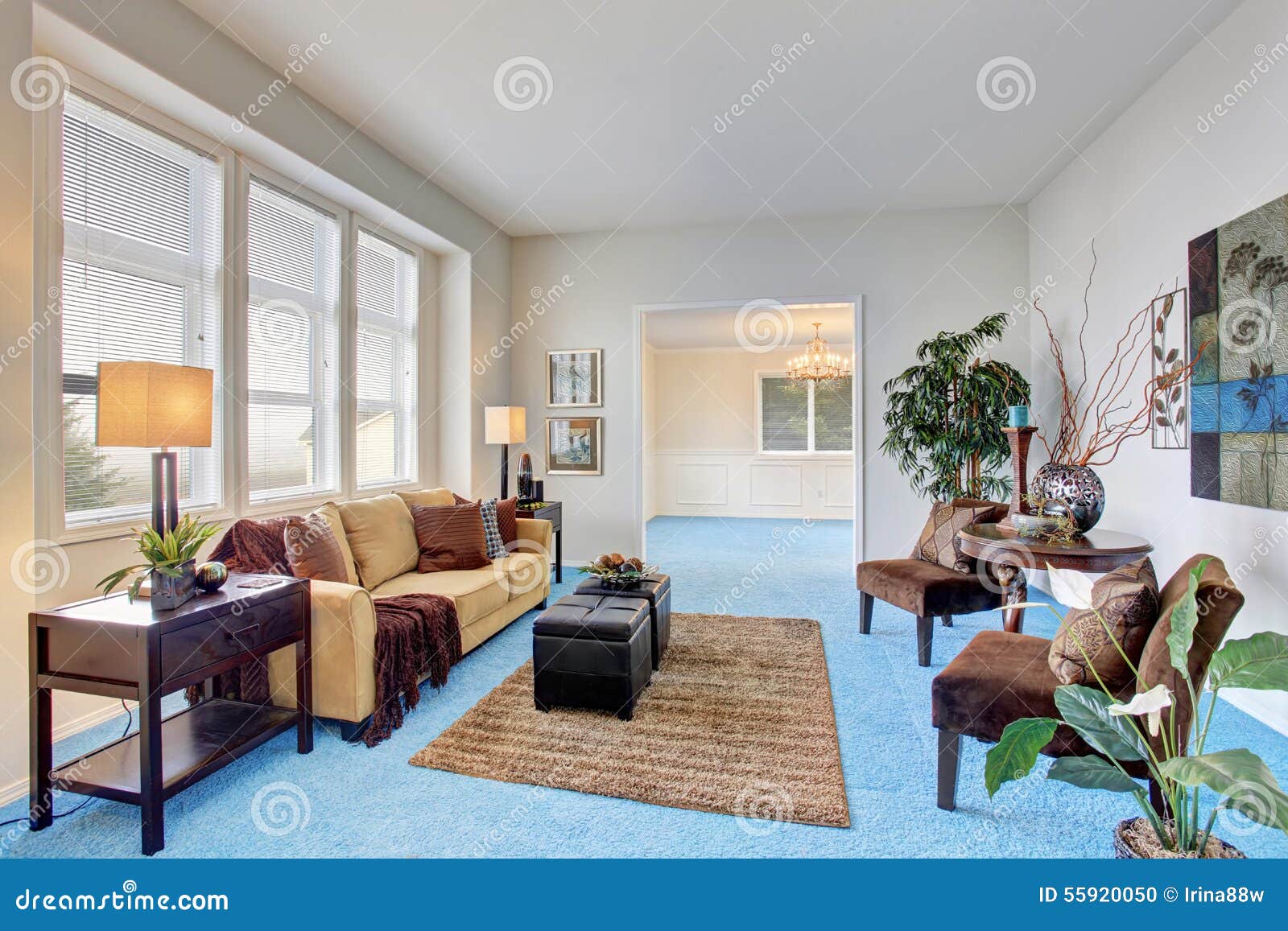 Georgous Living Room with Bright Blue Carpet. Stock Photo - Image of