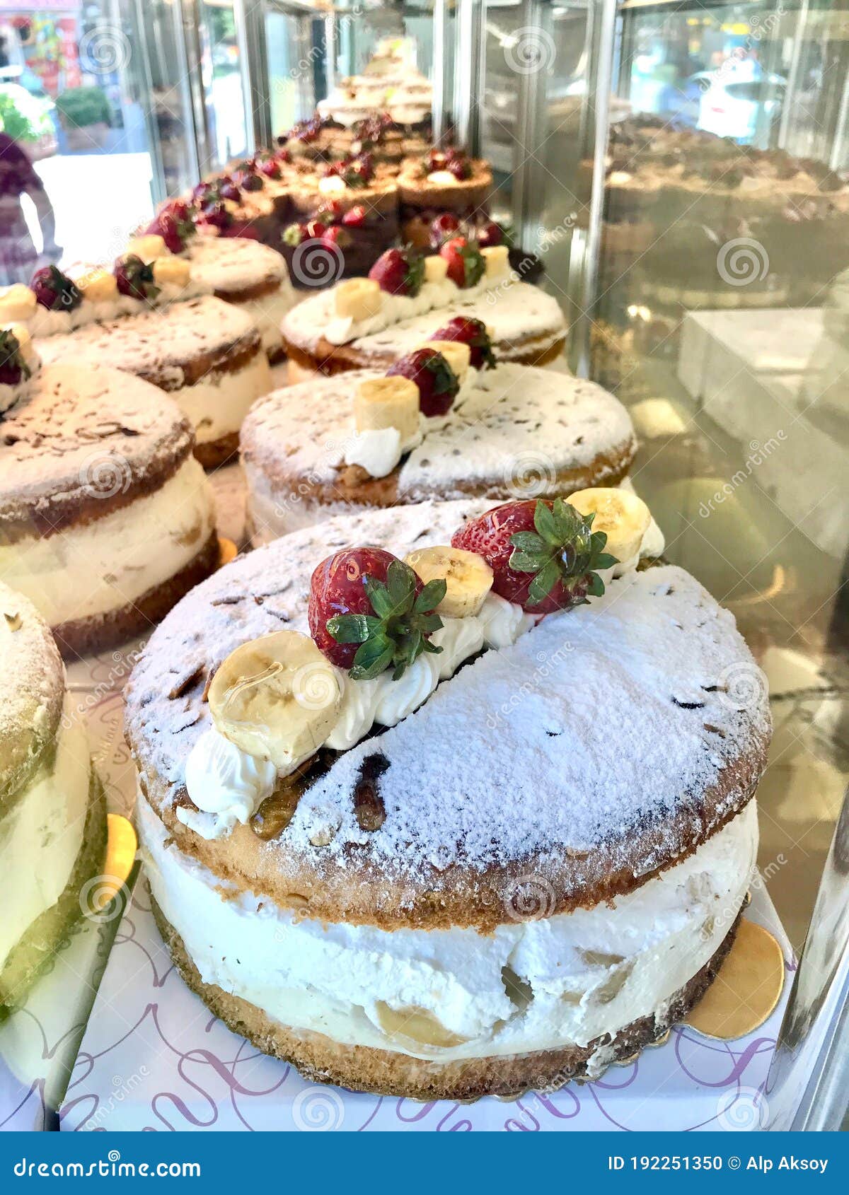 German Donut Whole Berliner Cake for Sale at Patisserie Stock Photo