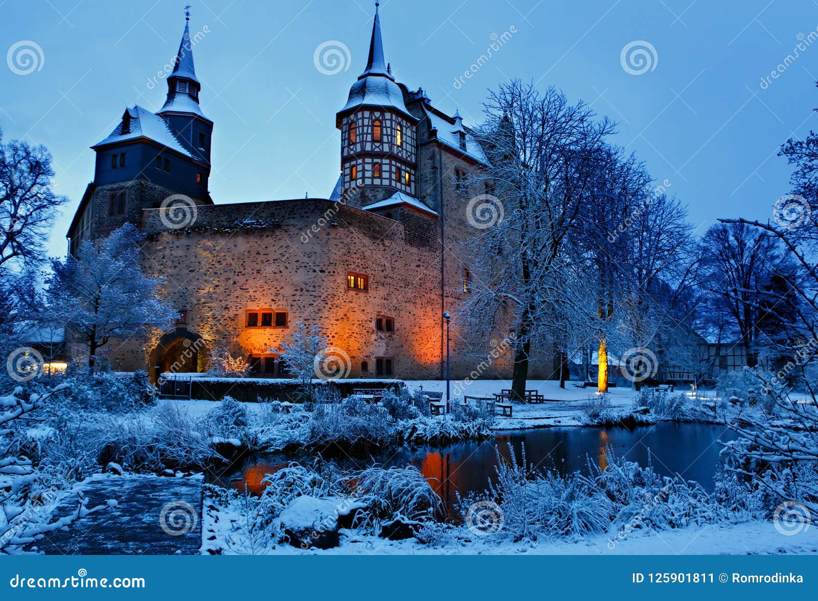german fairytale castle in winter landscape. castle romrod in hessen, germany