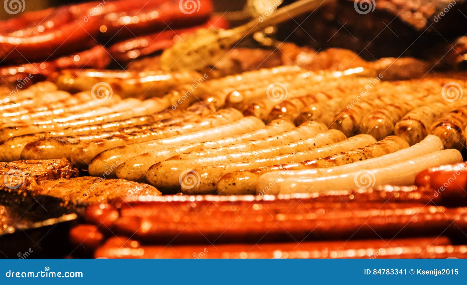 German Sausages. the Process of Cooking Over a Fire. Stock Image