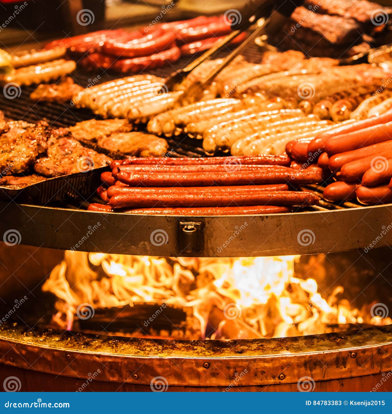 German Sausages. the Process of Cooking Over a Fire. Stock Image