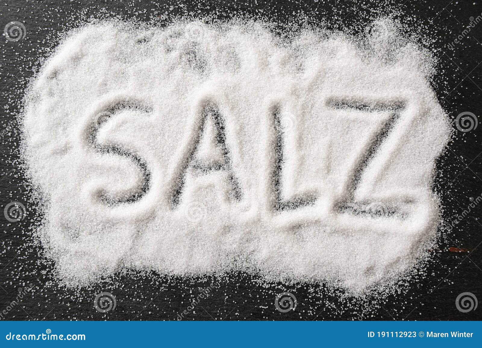 german-word-salz-meaning-salt-written-in-spilled-out-salt-crystals-on