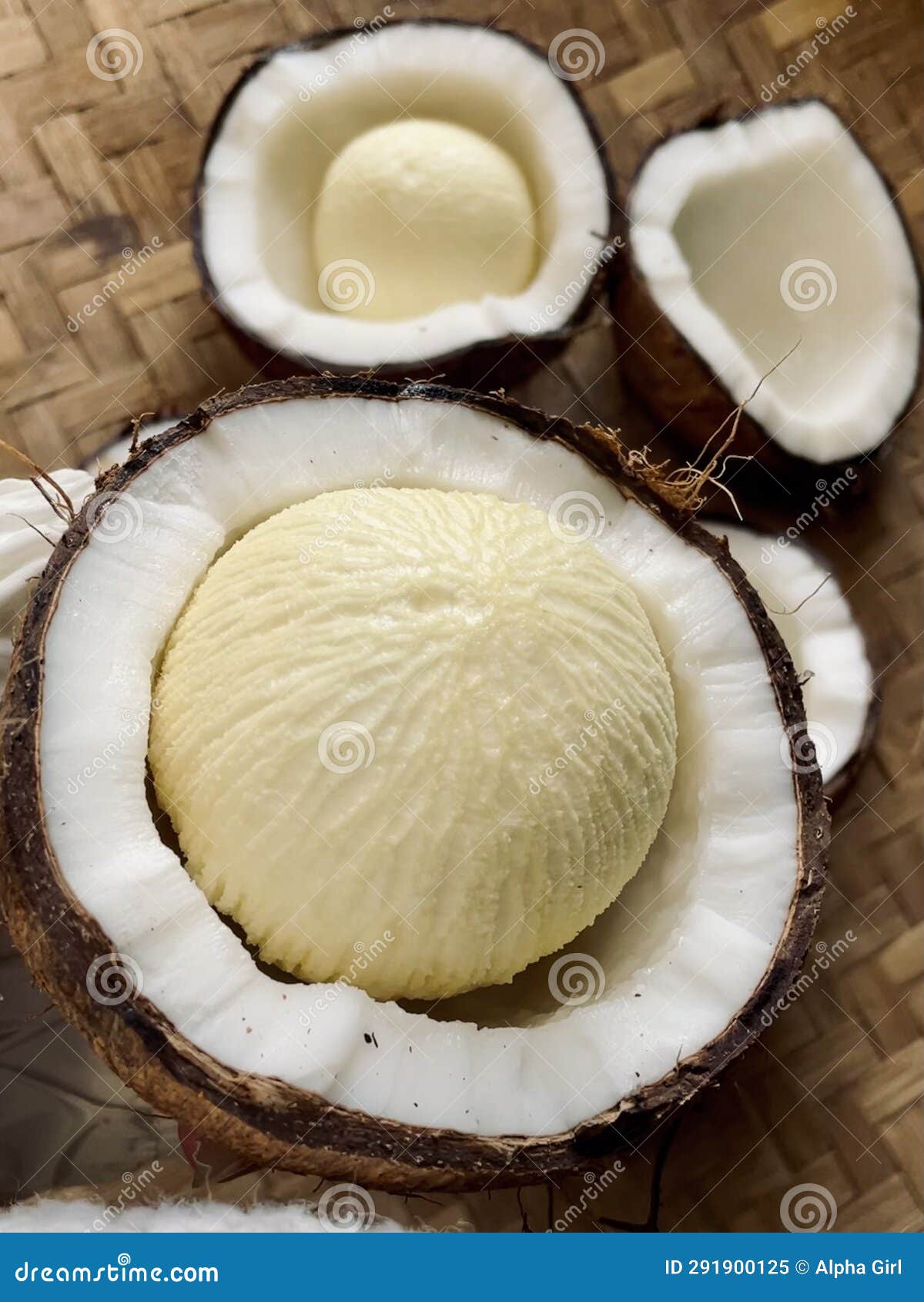 Portrait of a Coconut that Has Been Split into Two Parts and Shows the 