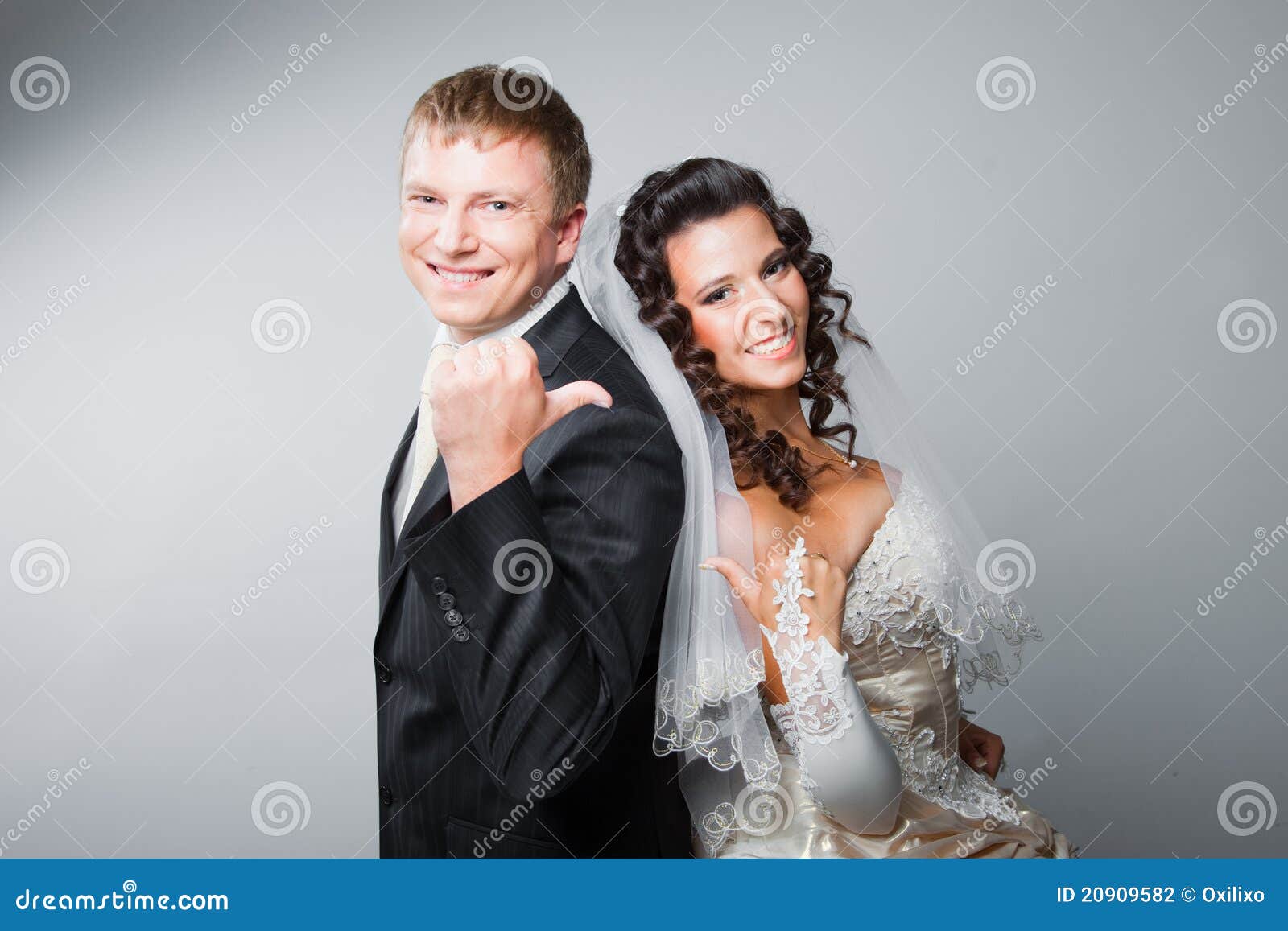 gesticulating bride and groom