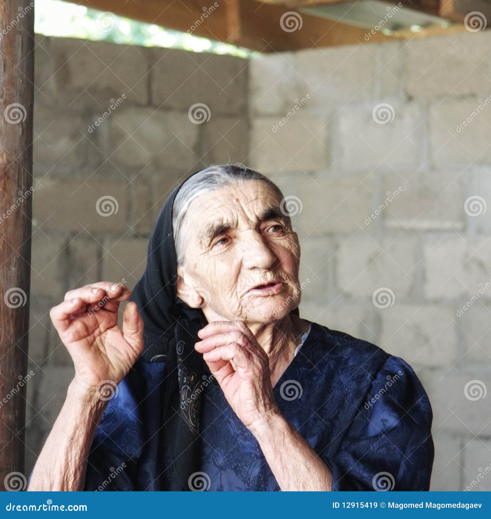 gesticulating elderly woman