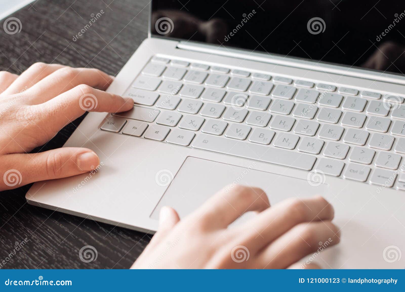 Gestures on the Touch Pad. Concept of Using a Retina Laptop Stock Image