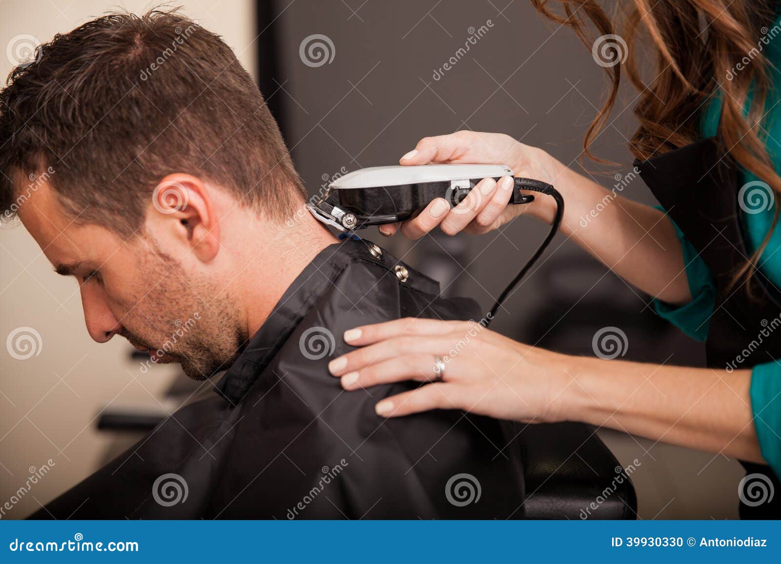 Getting haircut at a salon stock photo. Image of nape 