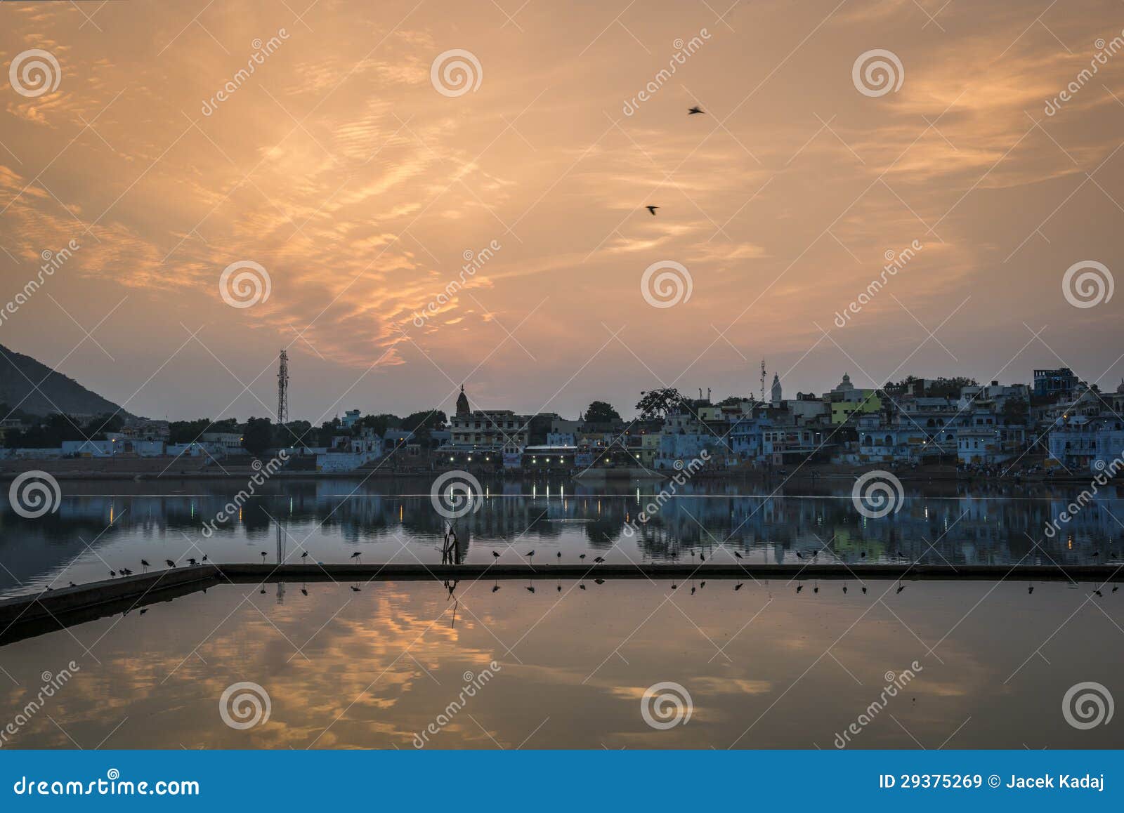 ghats on the holy lake of pushkar, rajasthan, india, by the sunset