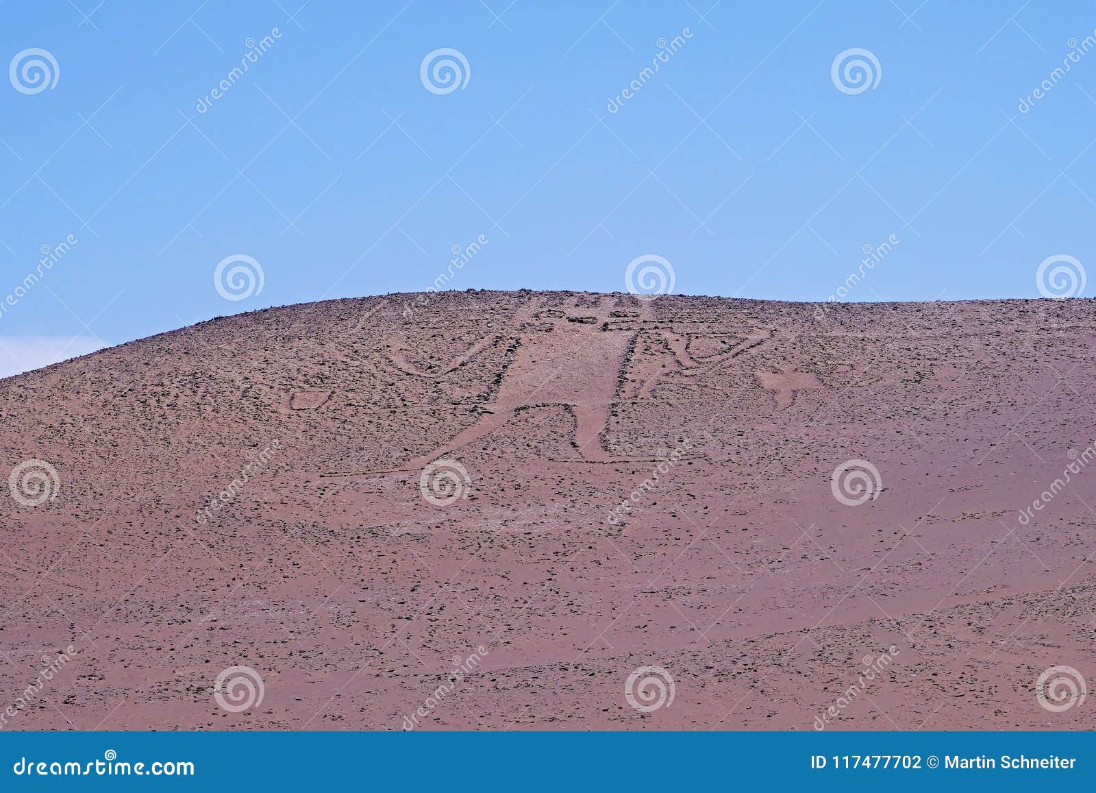 giant of the atacama, gigante de tarapaca, large petroglyph on a rocky outcrop in the atacama desert, tarapaca region