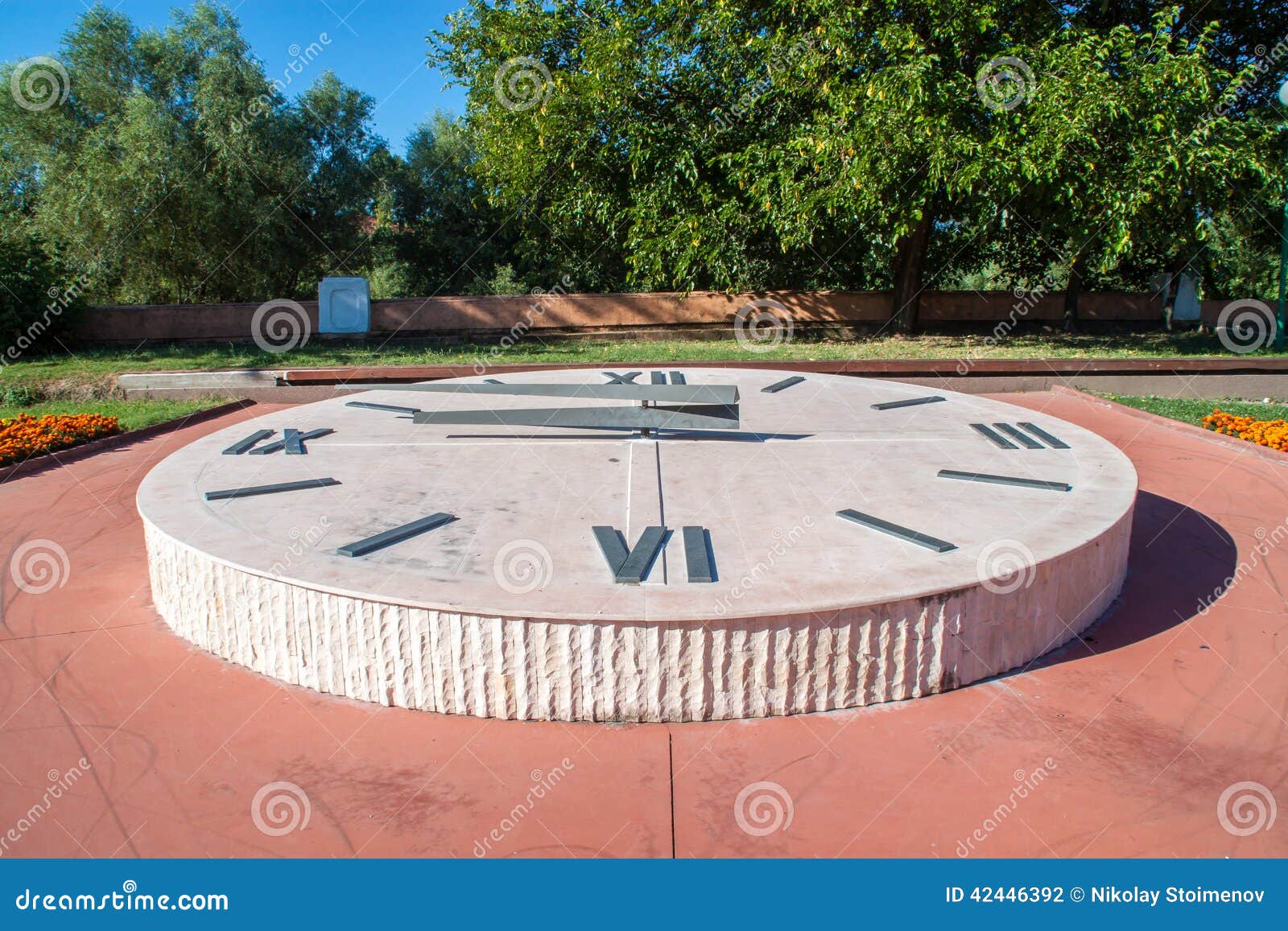 Image result for picture of a giant clock on the ground