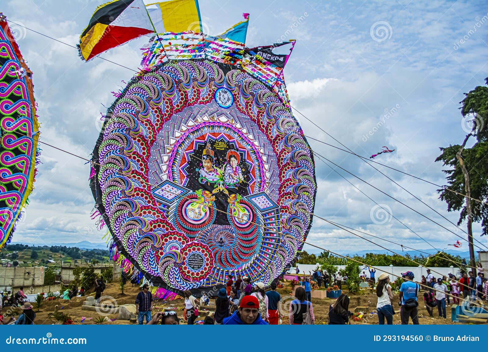 Giant Kite of Mayan Figures and Patterns in Circles with Flag