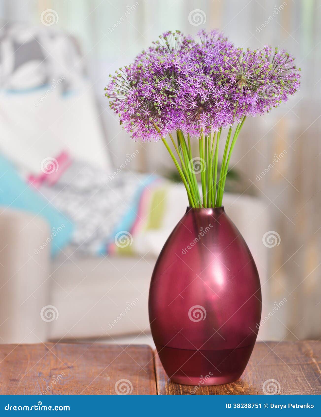 giant onion (allium giganteum) flowers in the flower vase on tab