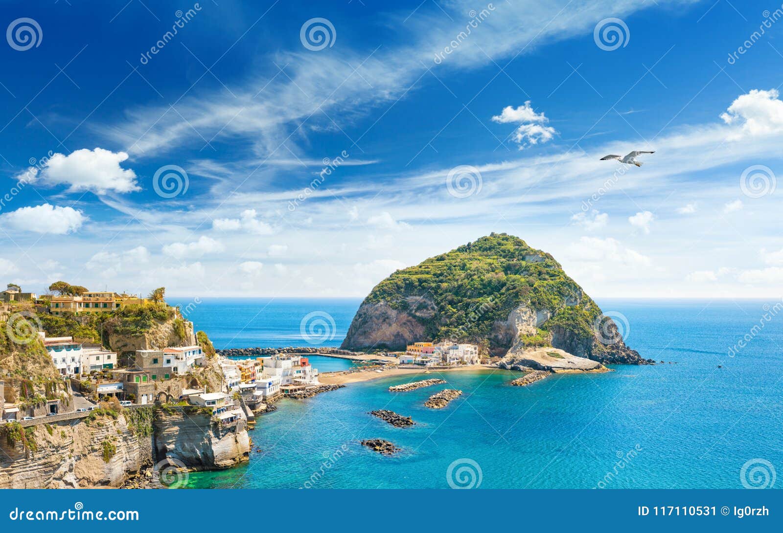 giant rock near small village sant`angelo in ischia, italy