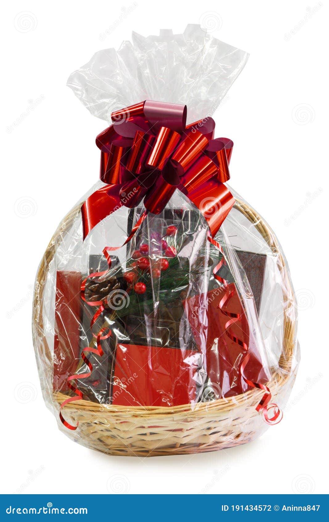 Gift Basket Packed in Transparent Paper with a Big Red Bow Isolated on