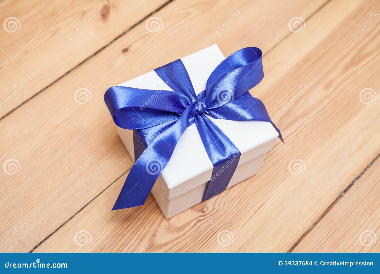 Gift box with blue ribbon stock photo. Image of wrap 39337684