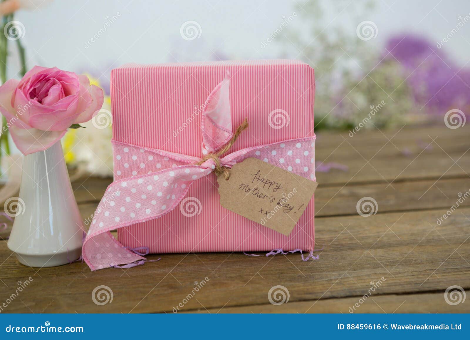 Gift Box and Flower Vase on Wooden Surface Stock Photo Image of
