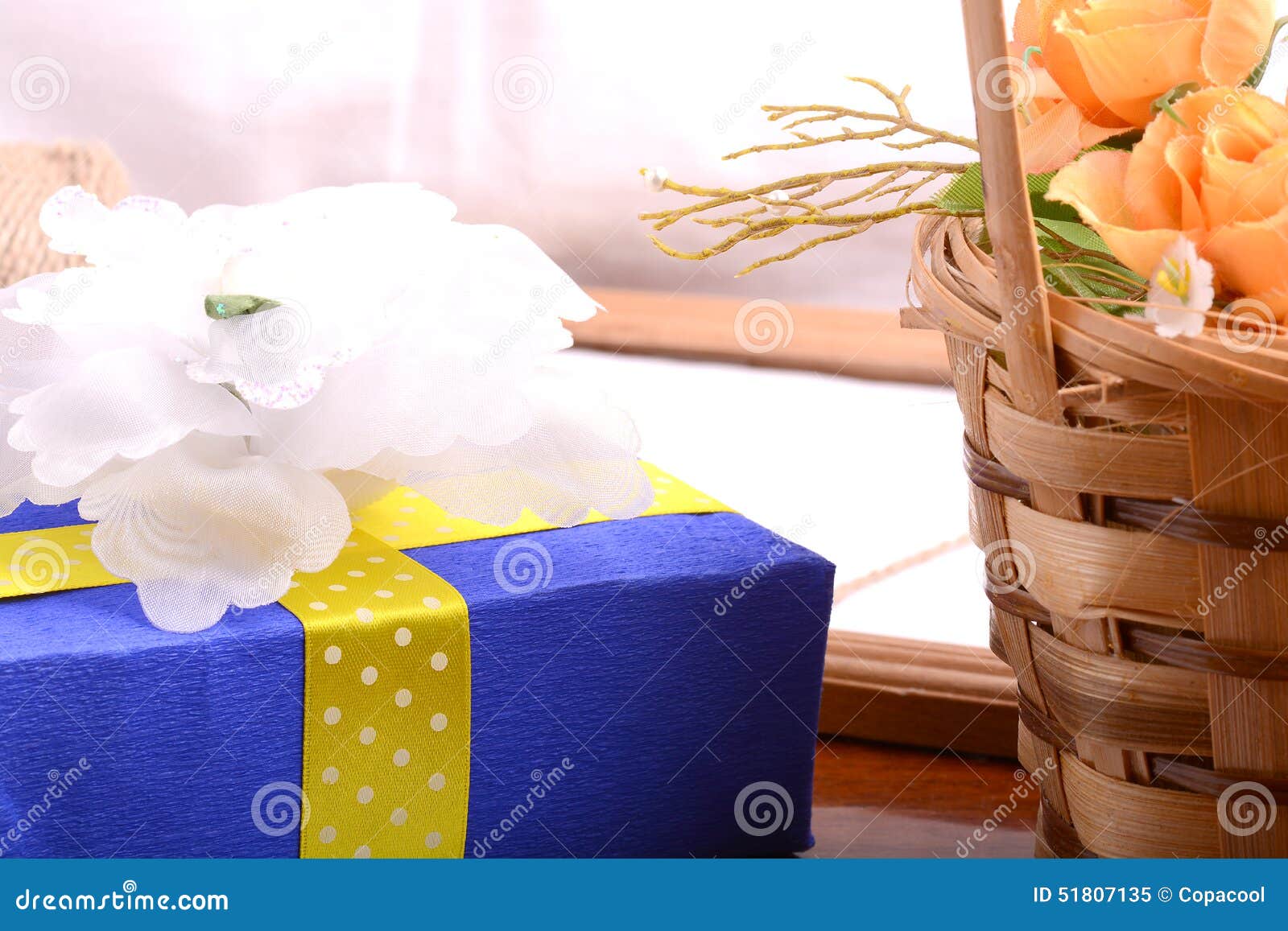 Gift box with flowers stock image. Image of gold, package 51807135