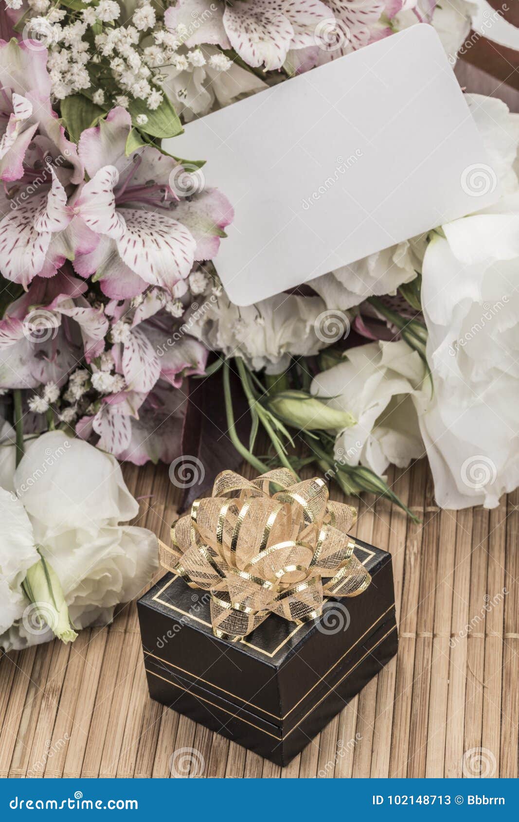 Gift Box And Flowers With An Empty Tag Stock Image Image