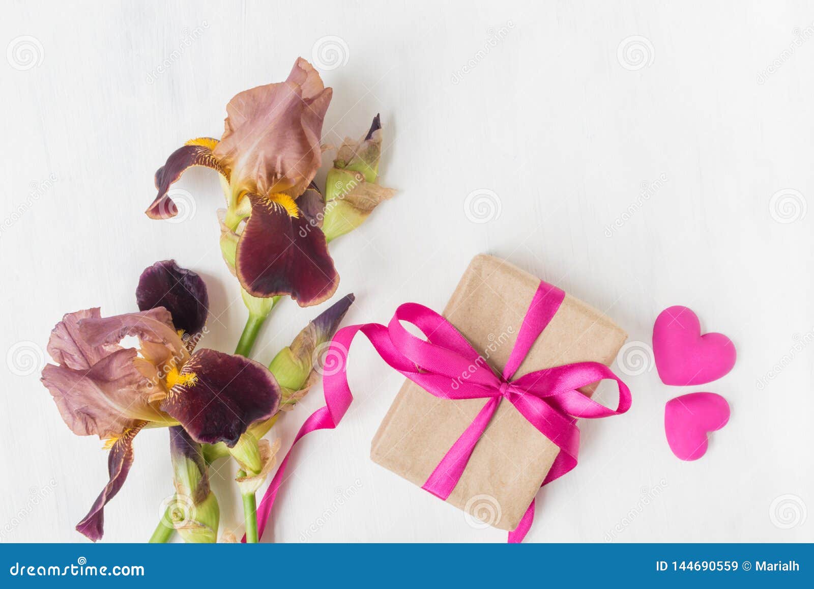 Gift box with iris flower stock image. Image of packing 144690559
