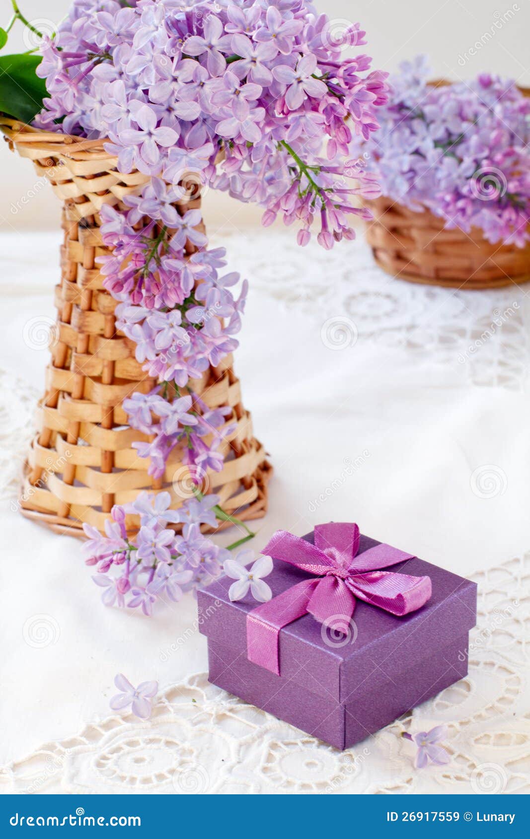Gift box and lilac bouquet stock image. Image of flora 26917559