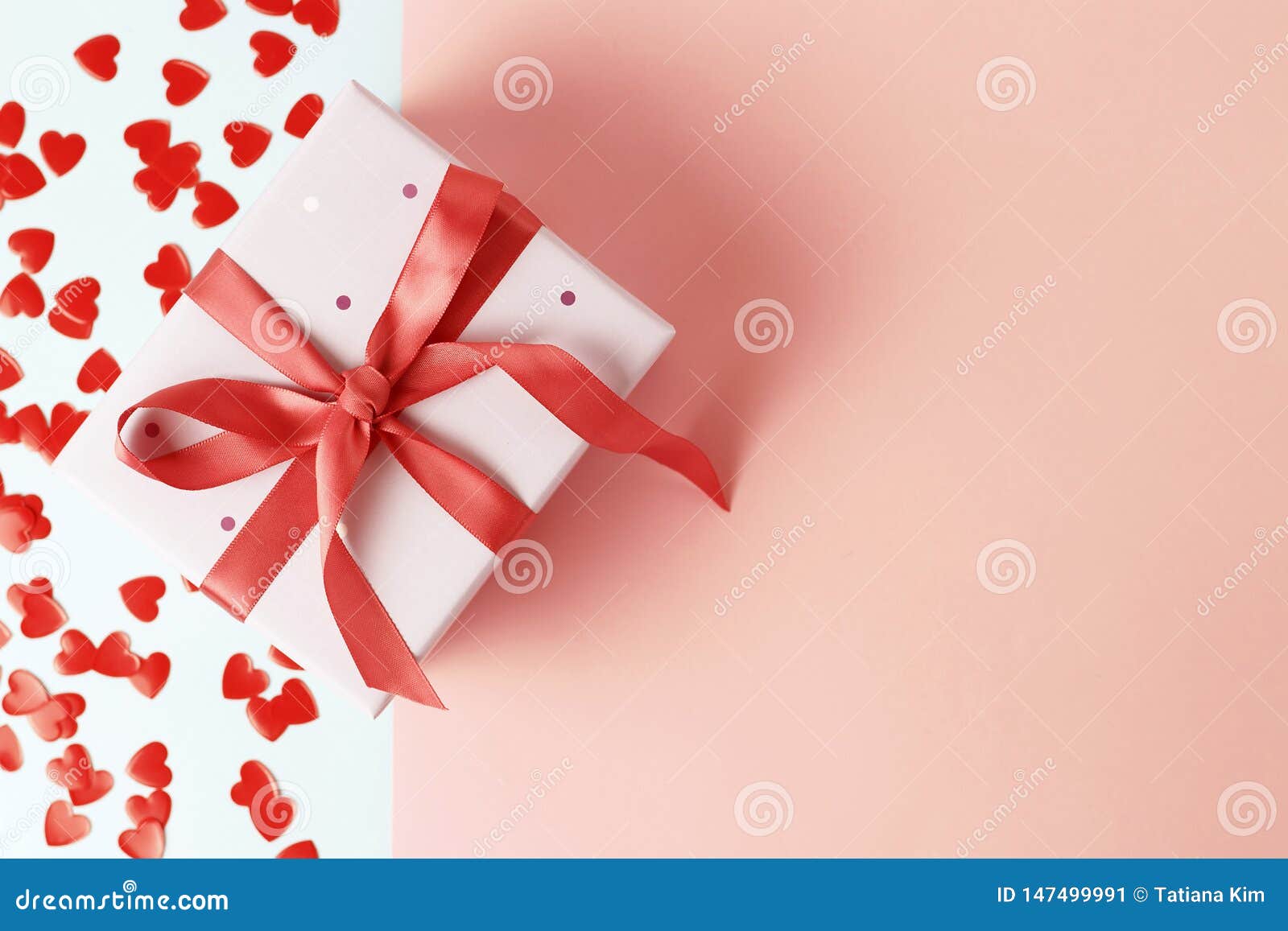 Gift Box on Pink and Blue Background Closeup, Copy Space Stock Image