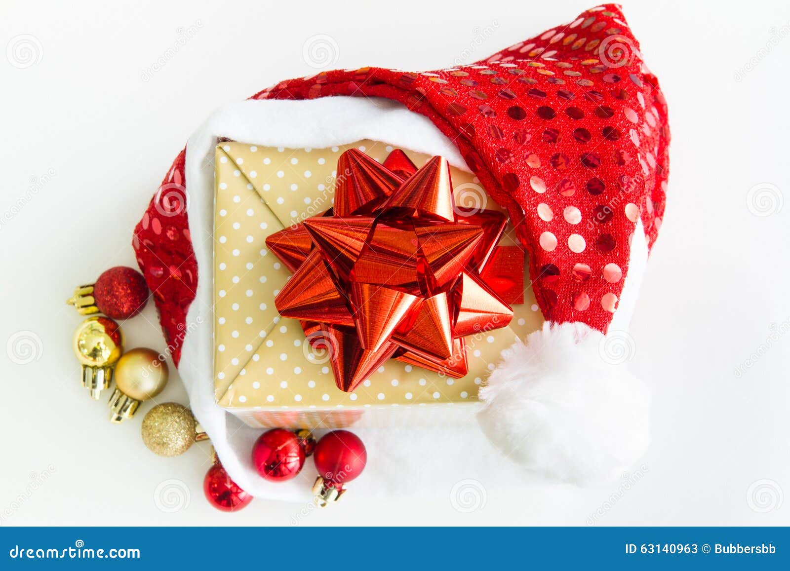 Gift Box with a Red Santa Hat and Sparkle Ball Stock Image Image of