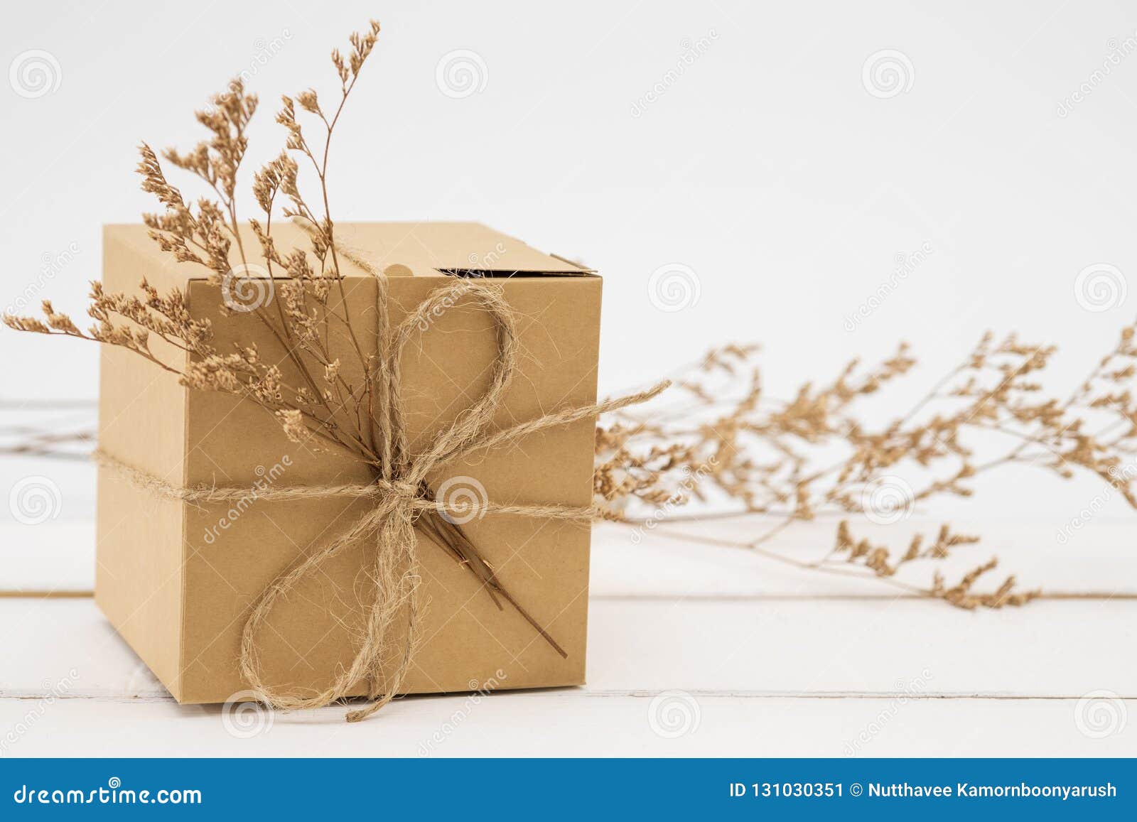 Gift Box Wrapped in Recycled Paper with Grass Stock Image Image of