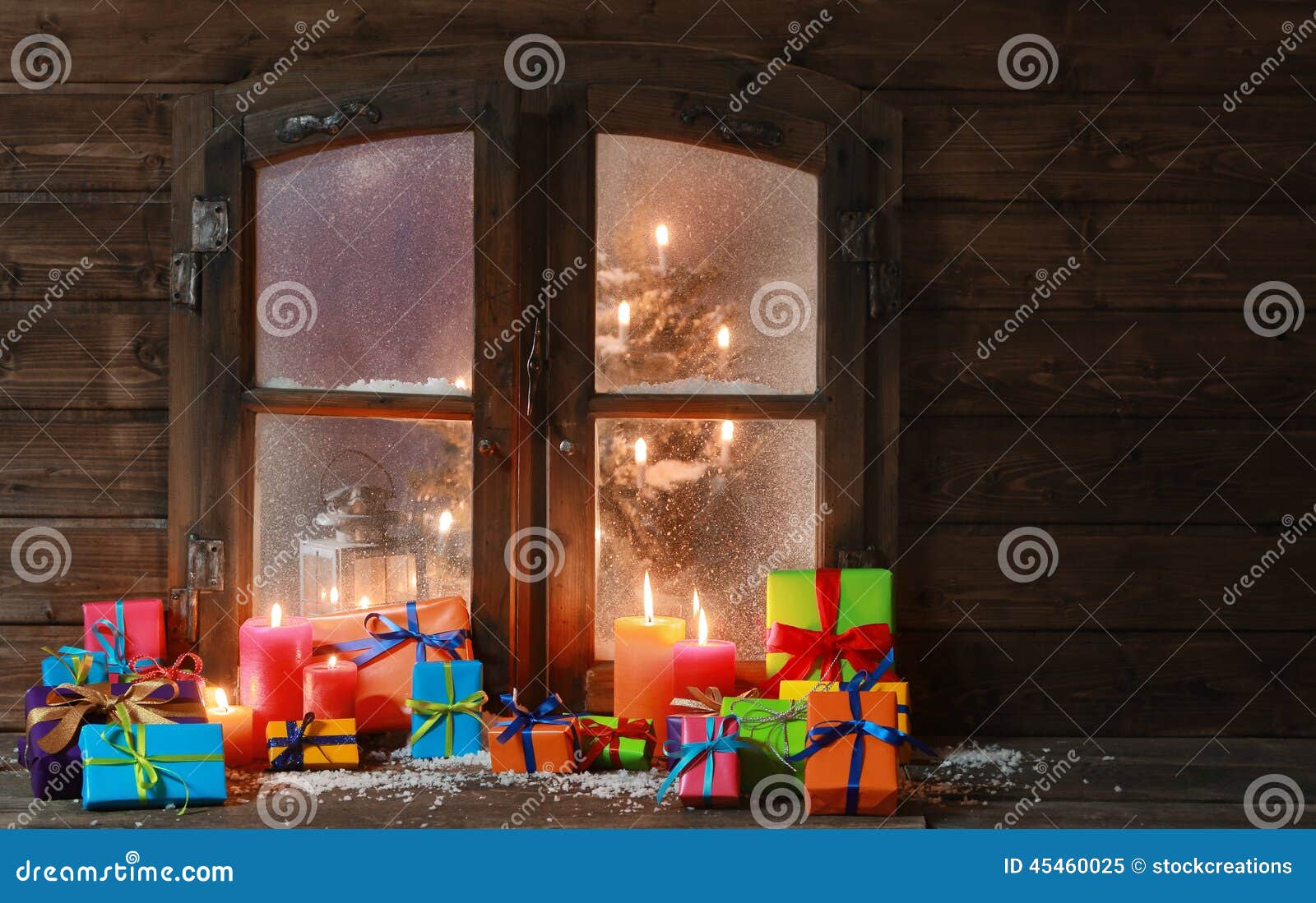 Gift Boxes and Candles at Window on Christmas Stock Image - Image of ...