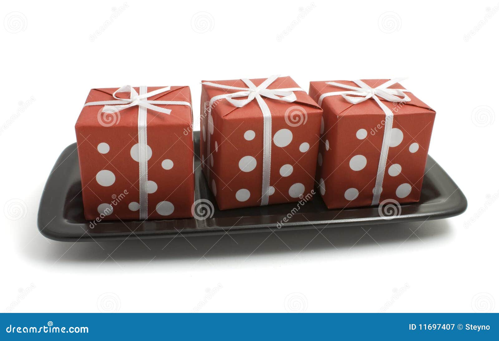 Gift boxes on a plate stock image. Image of year, tree 11697407