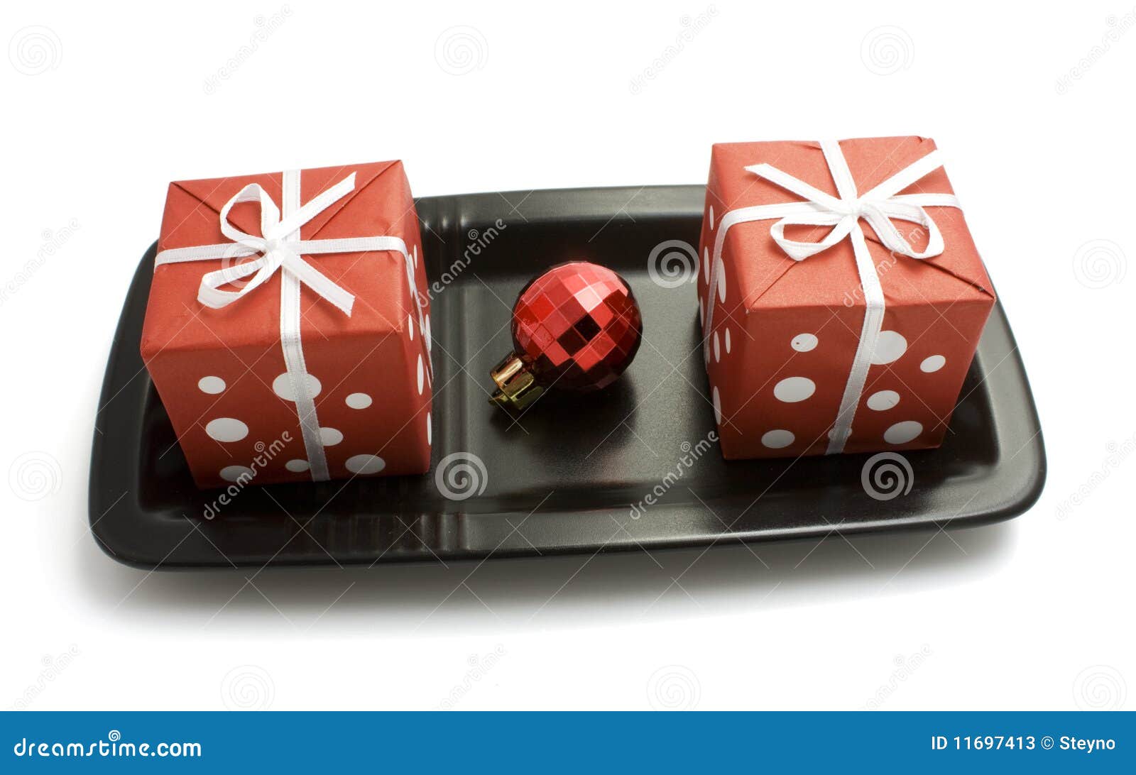 Gift boxes on a plate stock image. Image of celebration 11697413