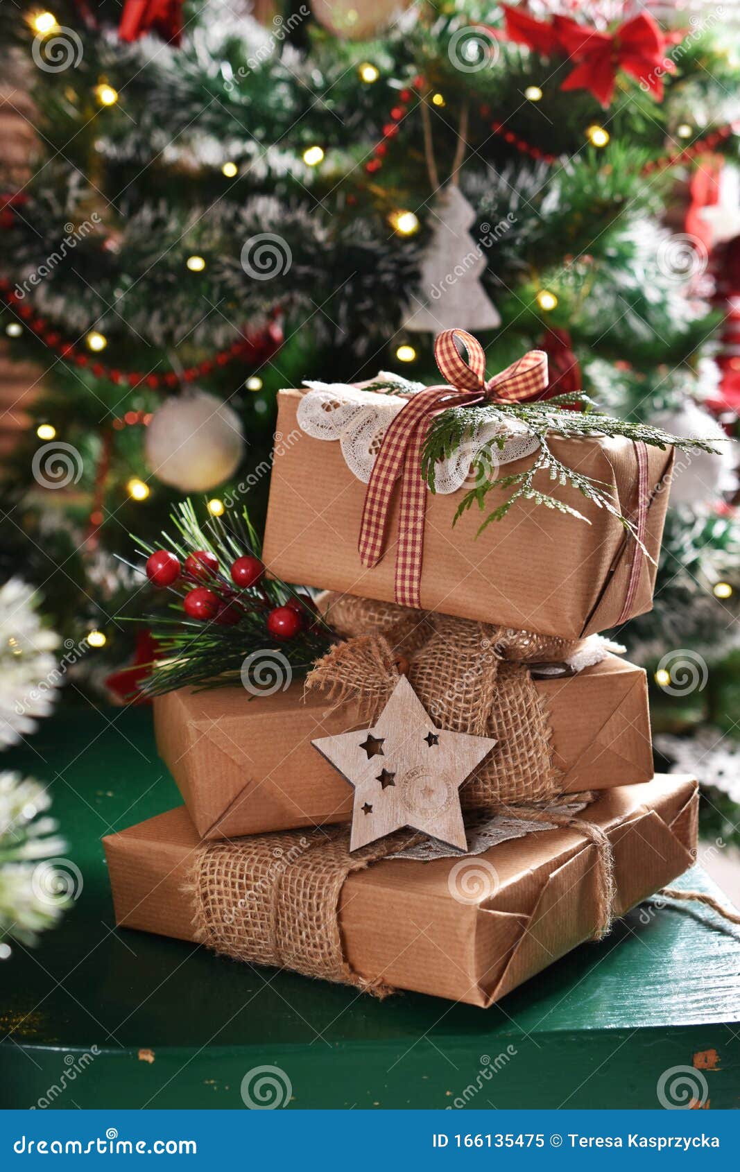 Gift Boxes in Rustic Style in Front of Christmas Tree Stock Image Image of celebration, giving