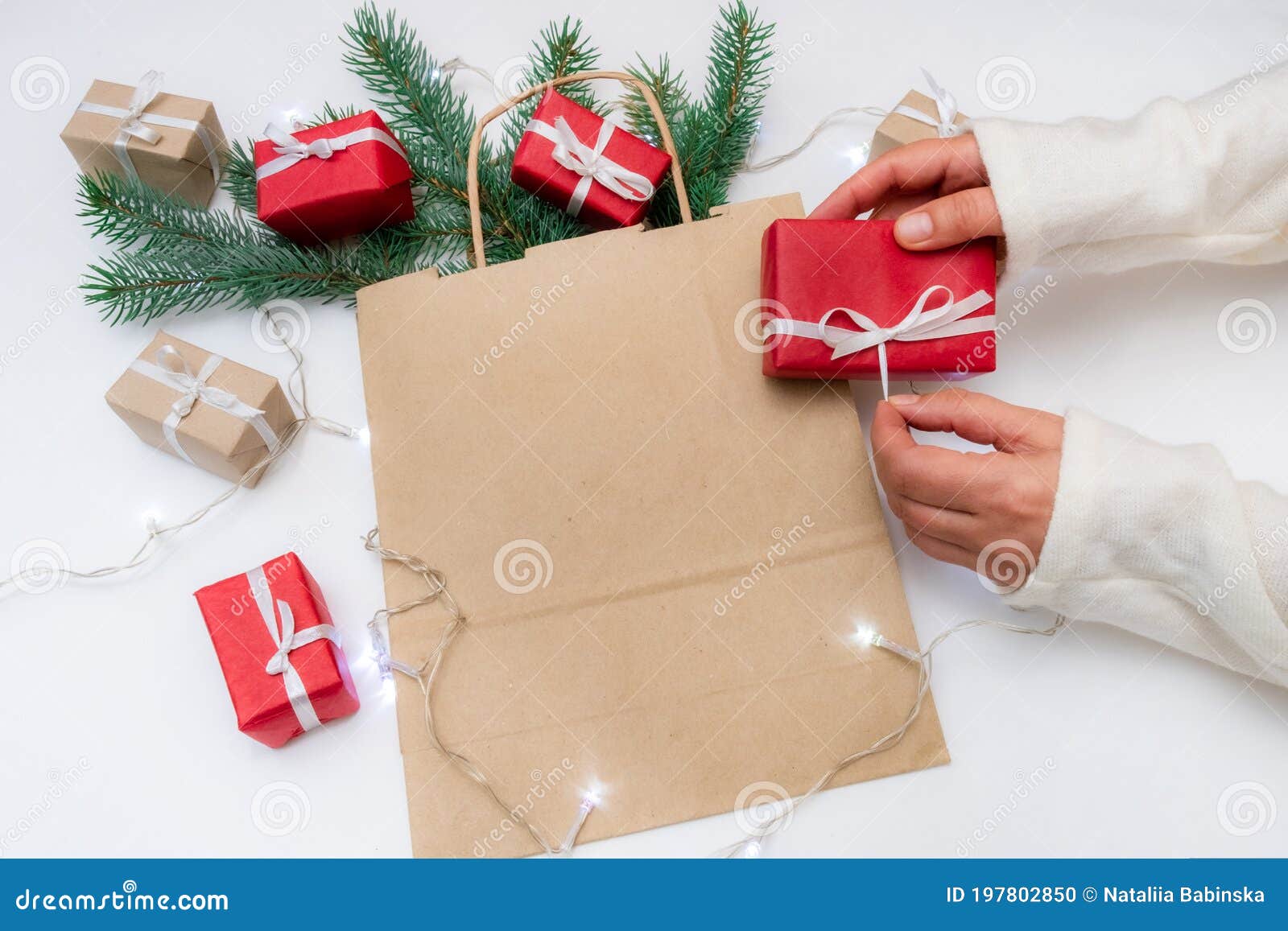 gift hand package white background red bag delivery christmas tree