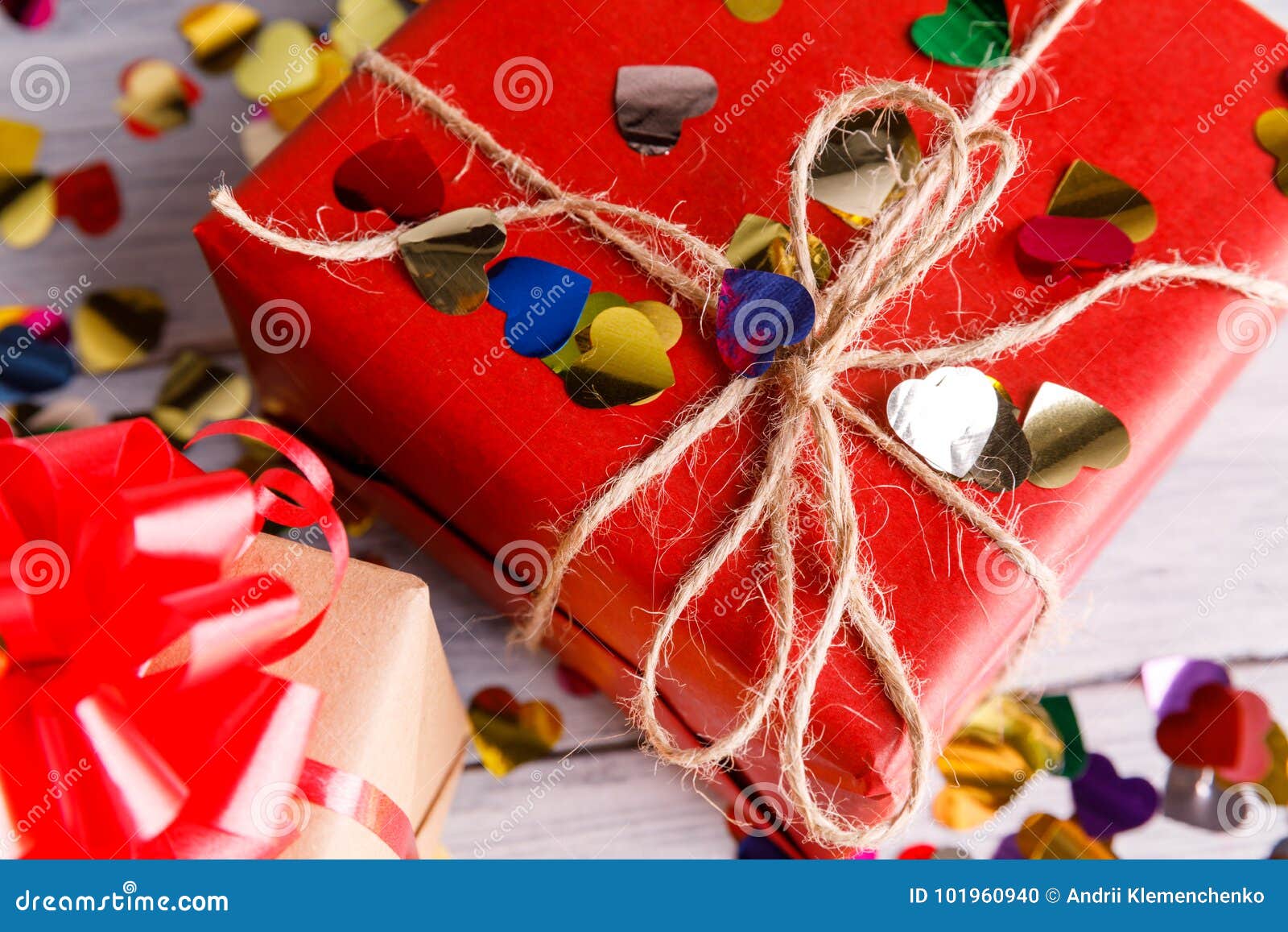 Gift in a Red Wrapper Close-up on a Gray Background Stock Photo - Image ...