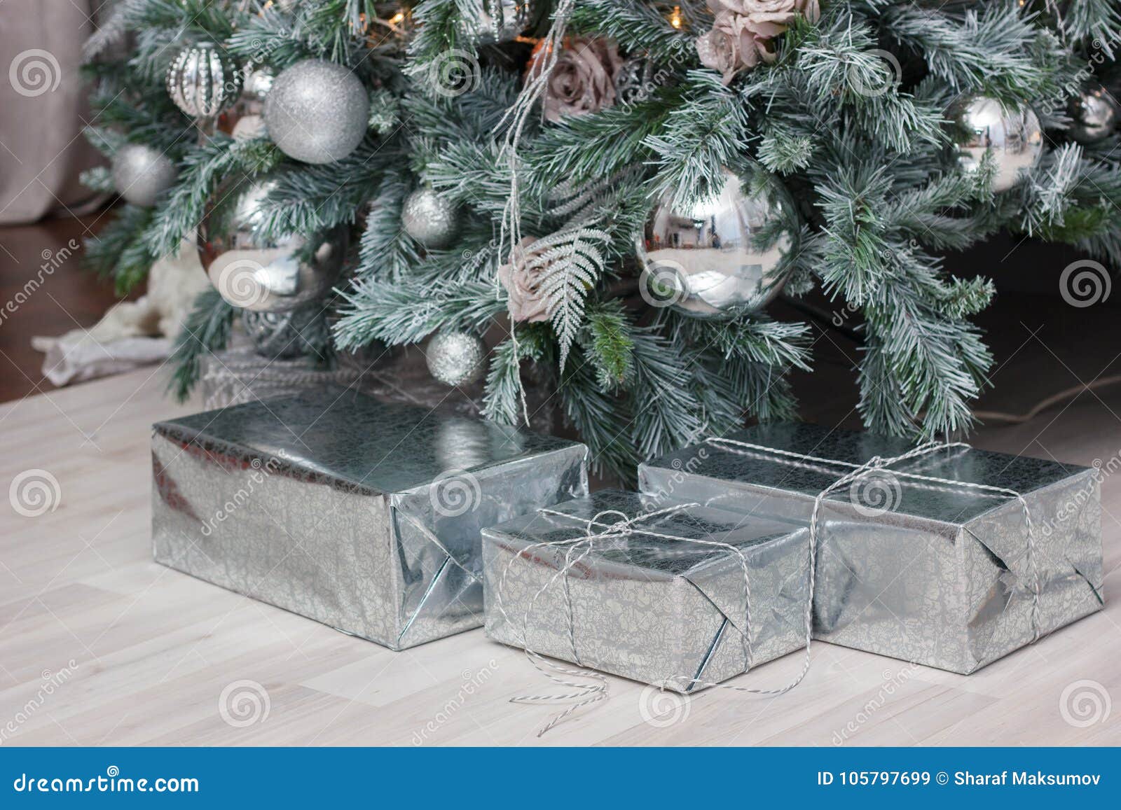 Gifts in a Box Under the Christmas Tree. Stock Image Image of silver