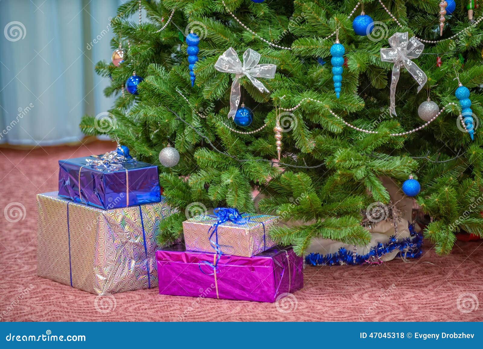 Gifts under christmas tree stock photo. Image of decor 47045318