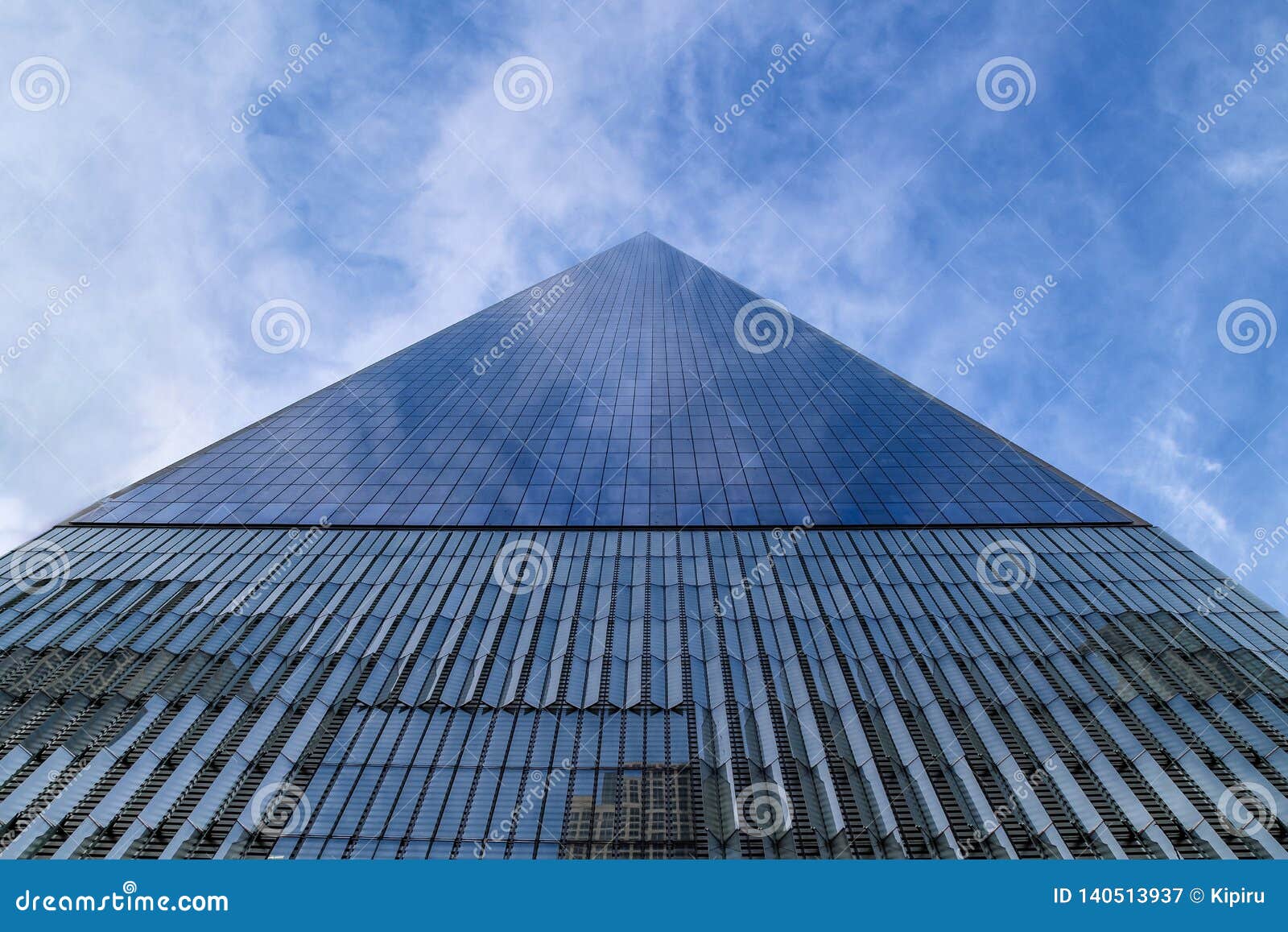 gigantic glass skyscraper from below, new york