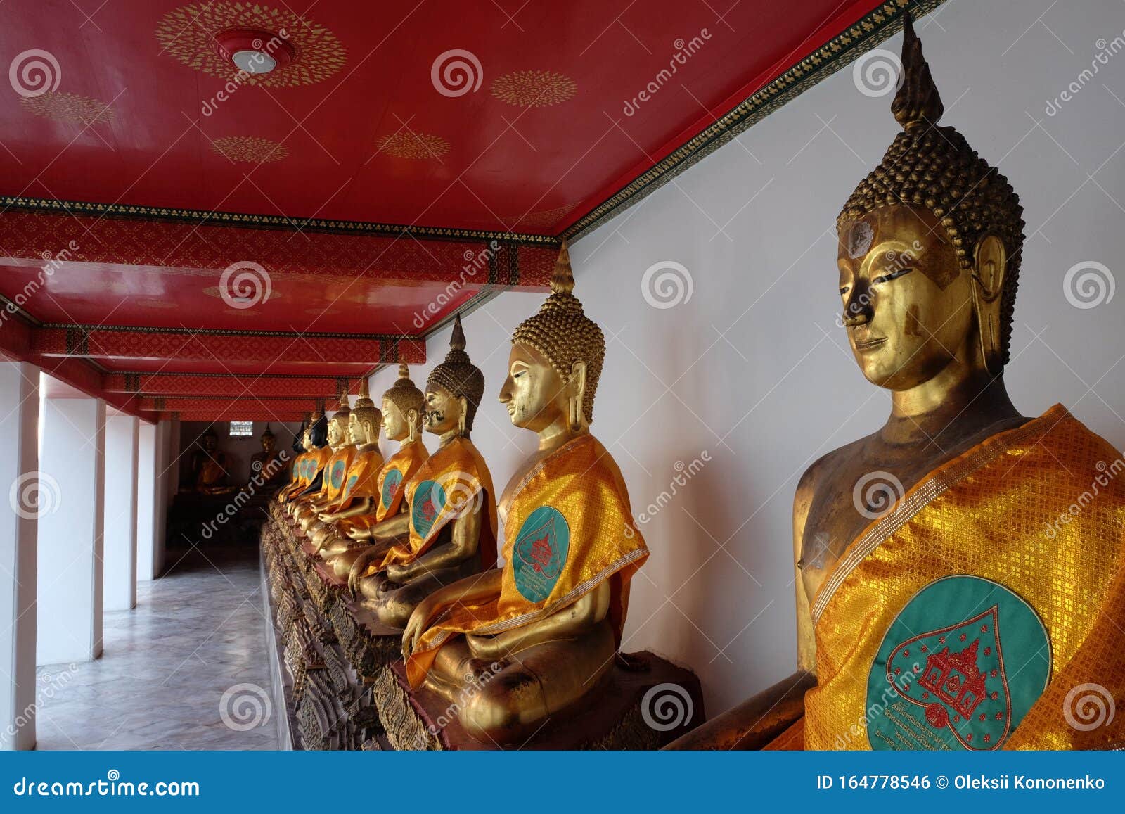 Gilded Statues of Buddha Sitting in Lotus Position. Statues from a