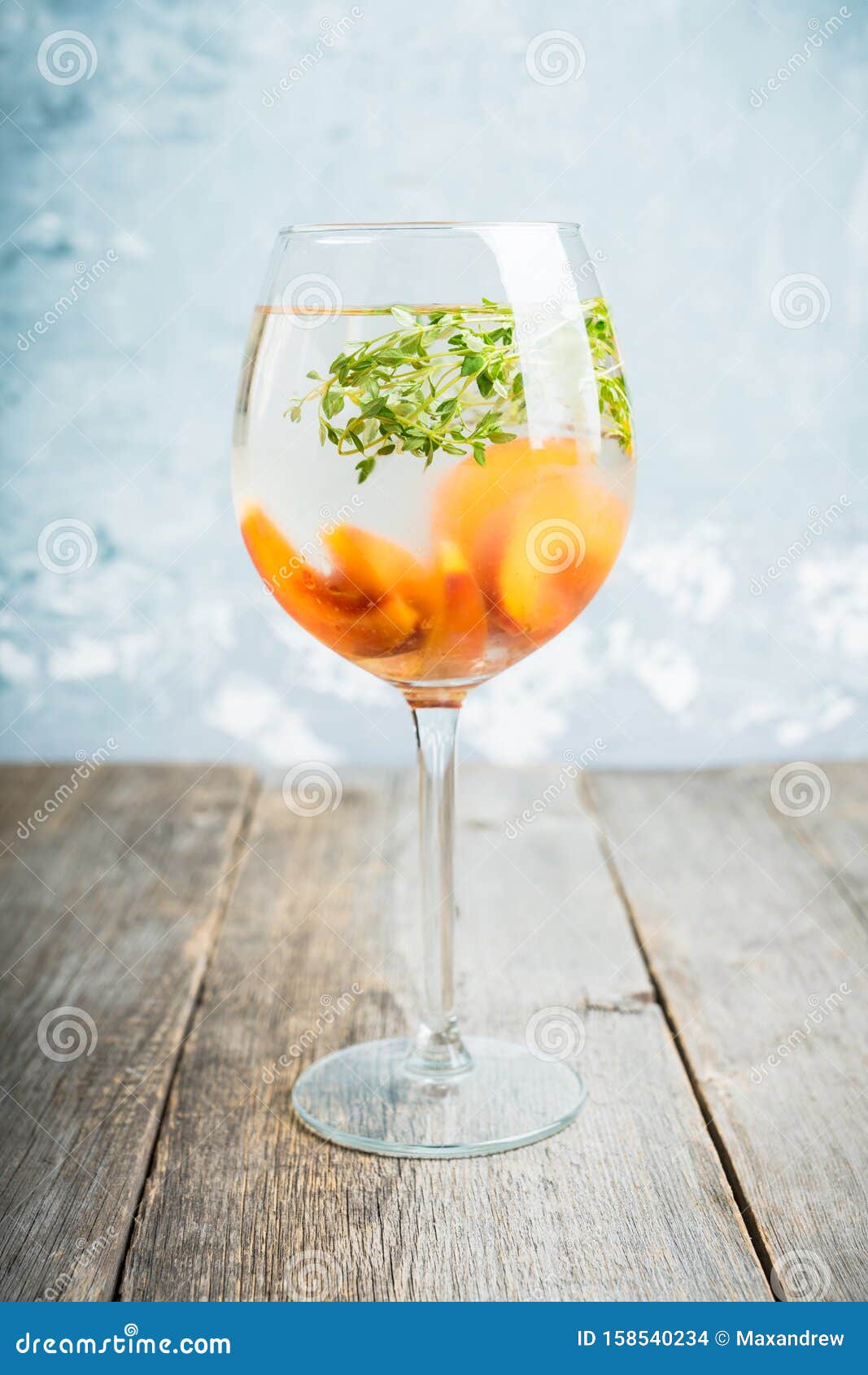 Gin Based Cocktail with Peaches and Thyme Stock Photo Image of rustic