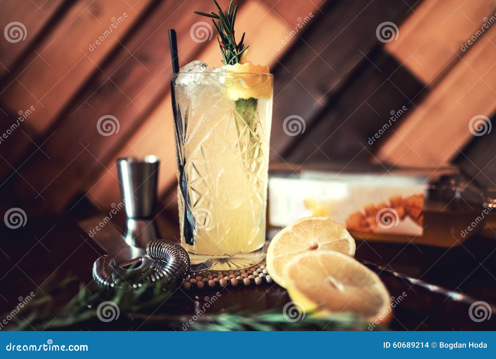 gin and tonic alcoholic cocktail with lime and ice, served as refreshment drink in local pub. party starter, nightlife