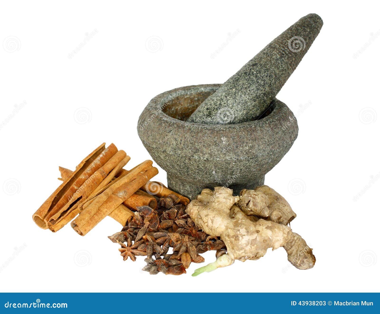 ginger, cinnamon and star anise with stone pounder