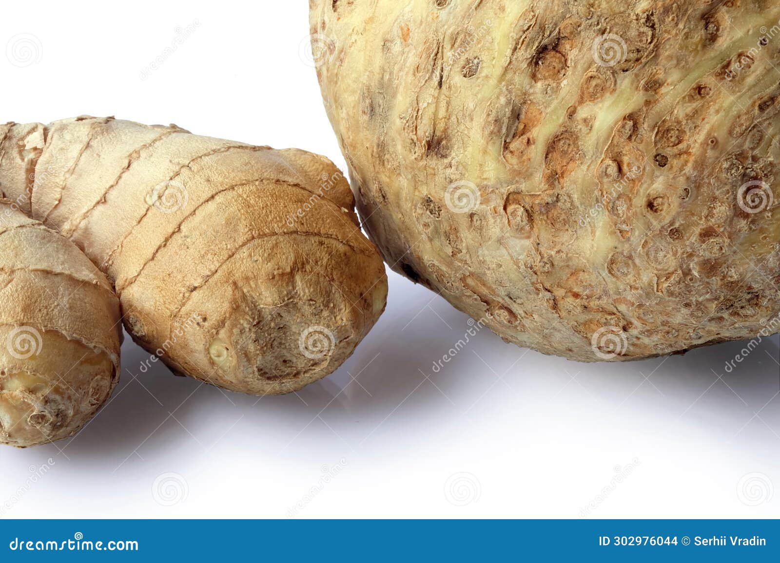 ginger root and celery on a light background