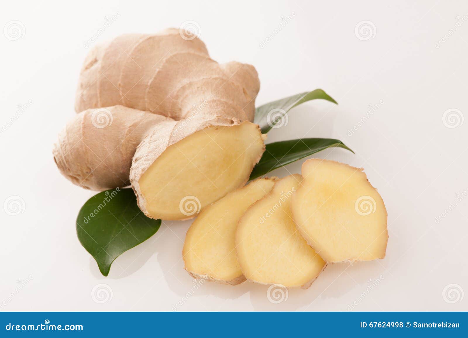 Ginger Root with Green Leaves Isolated Over White. Stock Photo Image