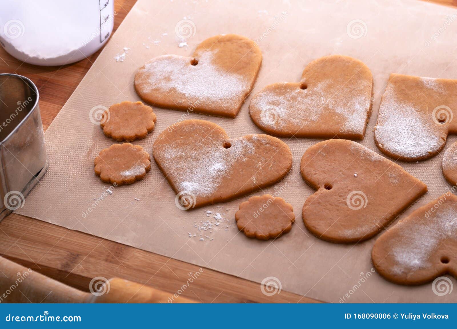 Blanks For Baking Cinnamon Rolls On Baking Sheet With Parchment Paper