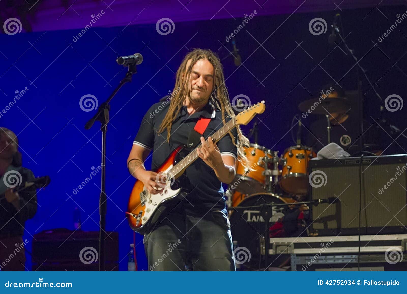 Spriano Leader Band Roots in Cement Editorial Stock Image