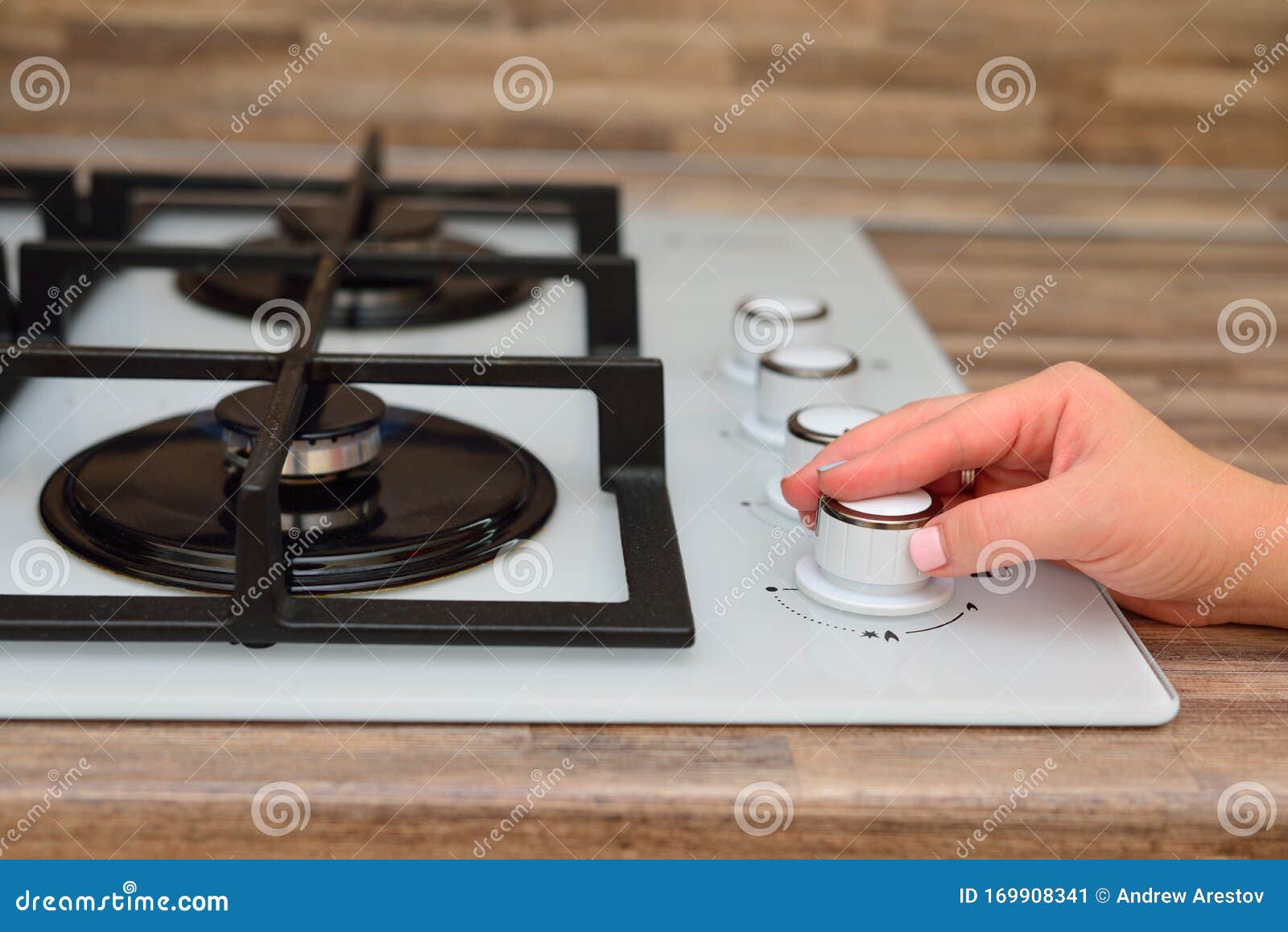 Girl Adjusts the Flame of the Gas Panel Stock Image Image of stove