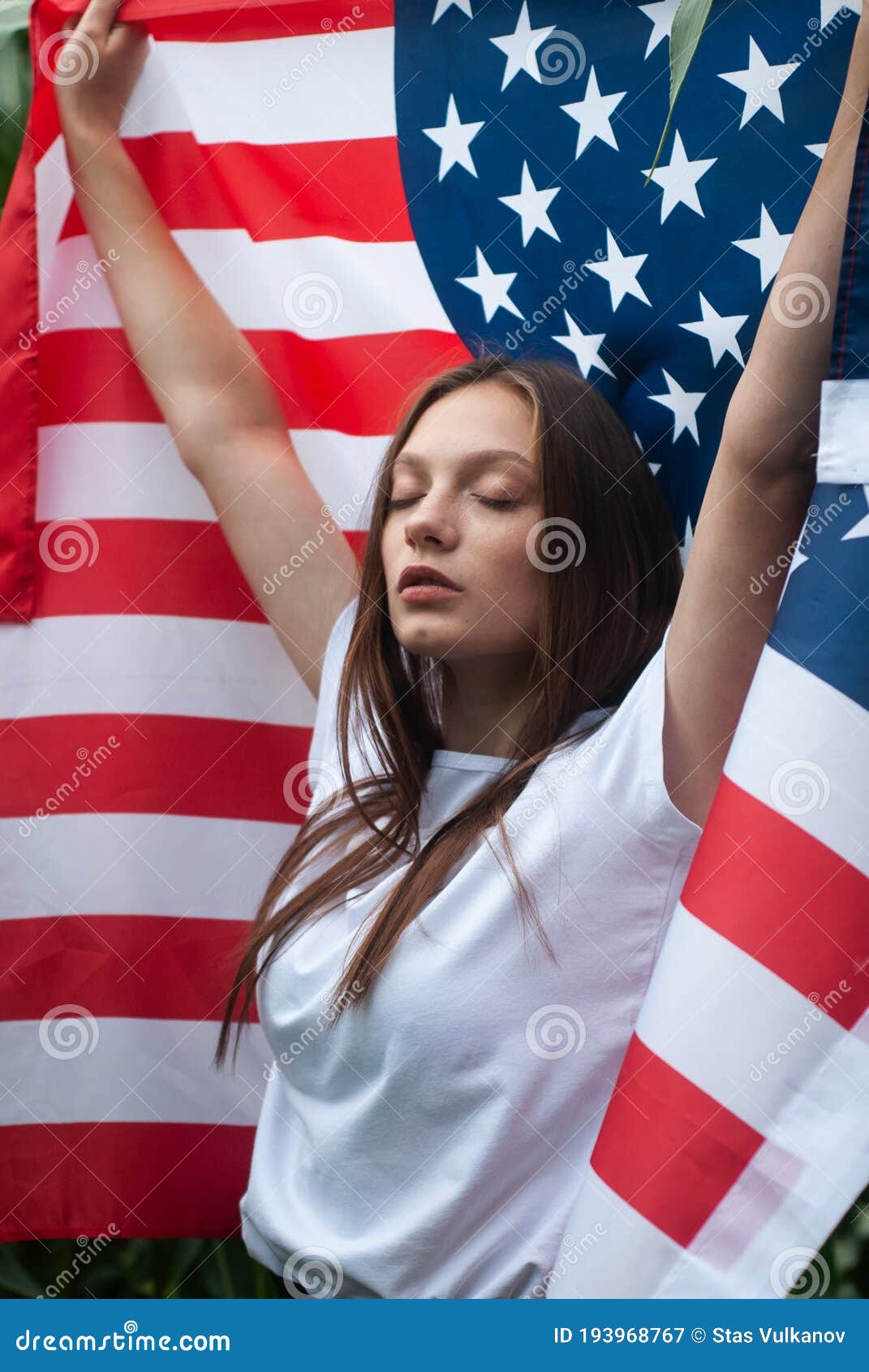 The Girl with the American Flag Outdoors, the Location is a Cornfield